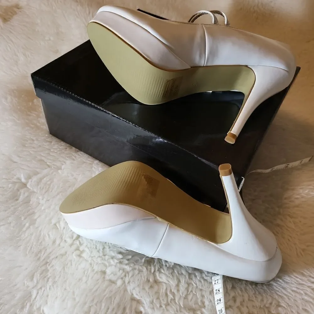 White patten Mary Jane's, with light pink platforms size 5/6